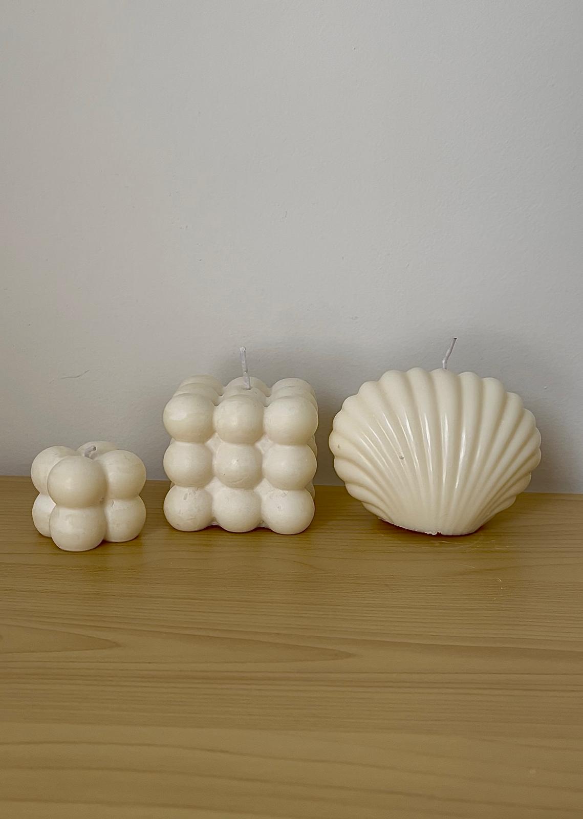 Velas decorativas de cera de soja 100% natural hechas a mano, parte de la colección ecológica y vegana de Winged Essence.